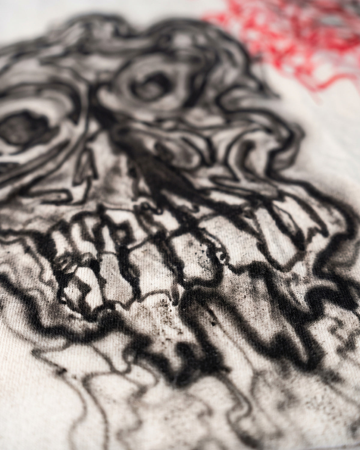 ATO Skeleton Cut-sleeve – close-up of the airbrushed melting skull
